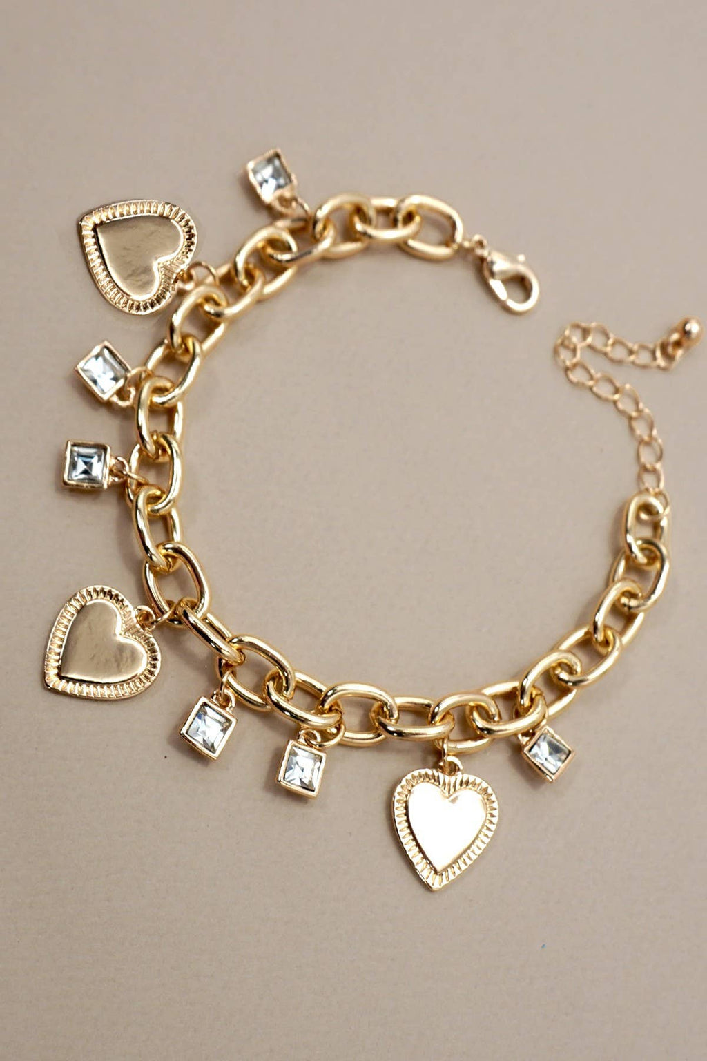 The Rhinestone Heart Charm Bracelet.