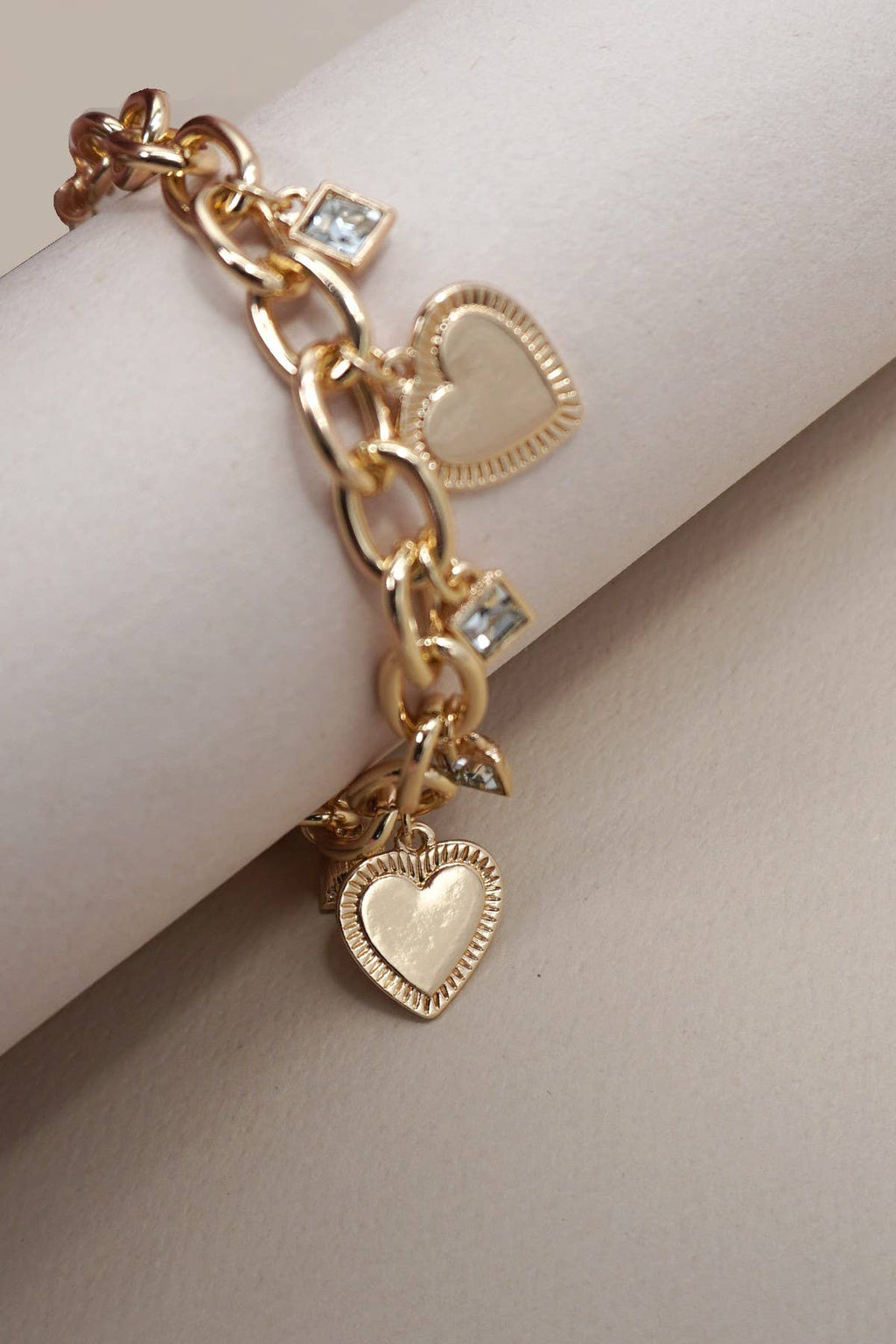 The Rhinestone Heart Charm Bracelet.